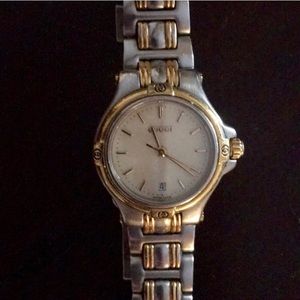 Authentic Gucci silver and gold tone watch